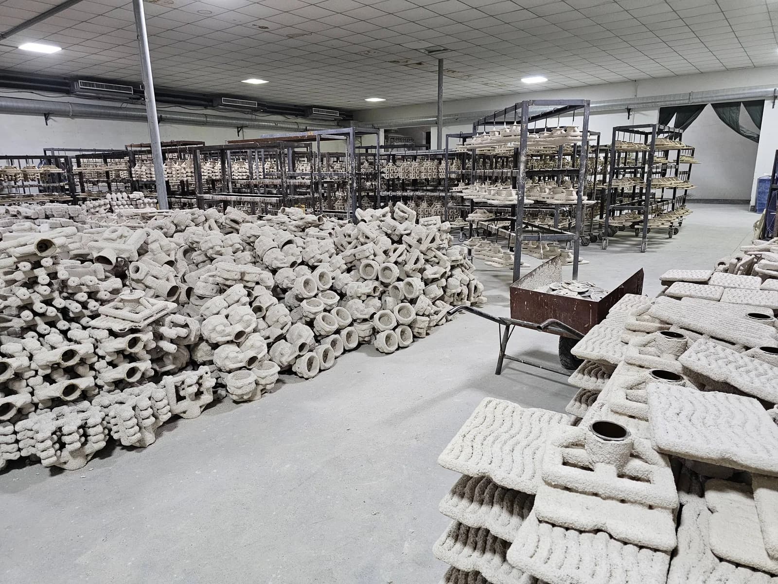 Rows of ceramic shell molds in the supplied workshop